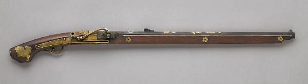 Appraisal: A matchlock rifle Edo Period With an octagonal steel barrel