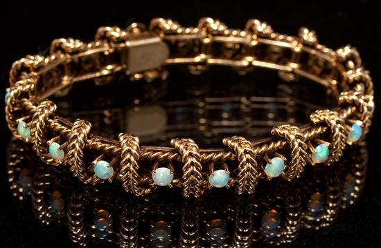 Appraisal: Lady's K yellow gold and opal link bracelet grams in