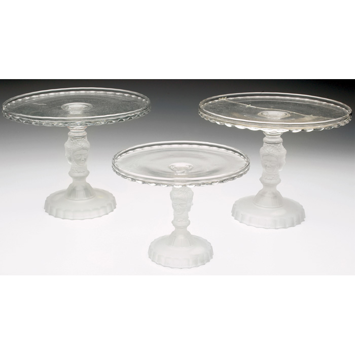 Appraisal: Three Face cake stands pair pedestal form in clear glass