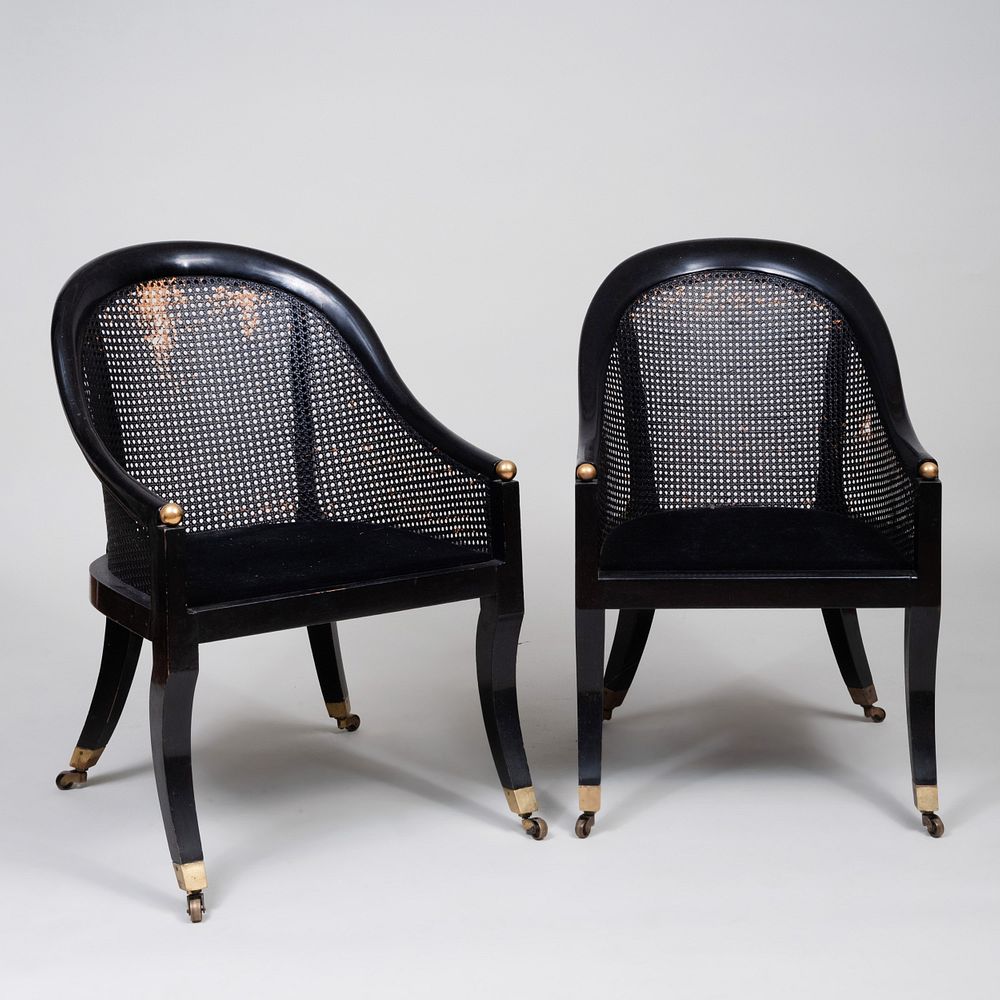 Appraisal: Near Pair of Regency Style Ebonized and Caned Gondole Chairs