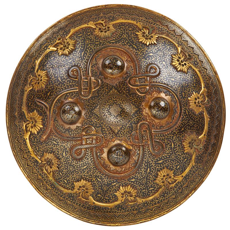 Appraisal: MIDDLE EASTERN BRONZE SHIELD Gilt decorated foliate scrolls and strap