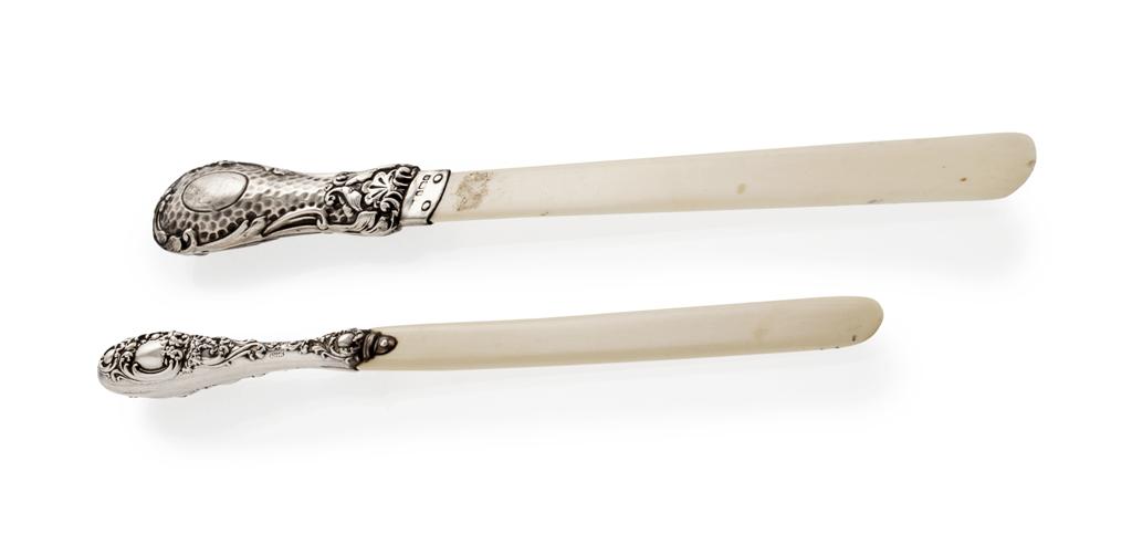 Appraisal: Two ivory and silver mounted page turners circa of small