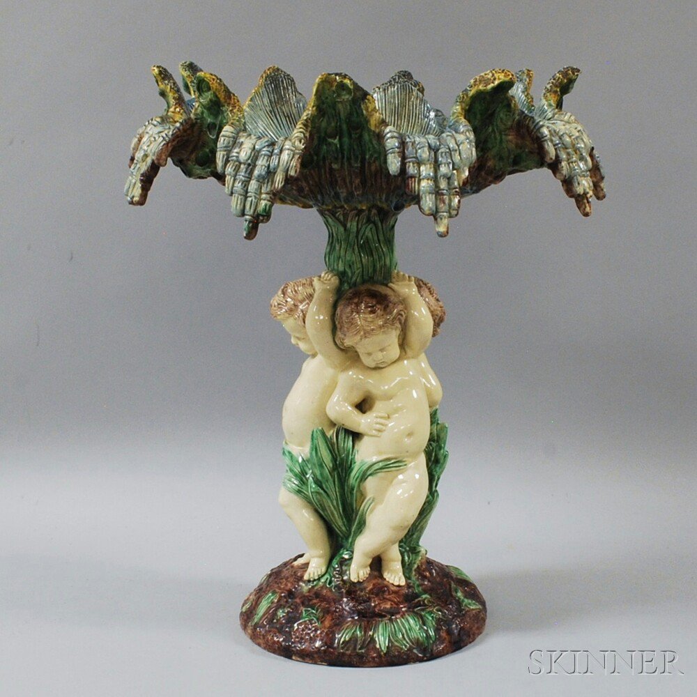 Appraisal: English Figural Majolica Tazza th th century depicting three putti