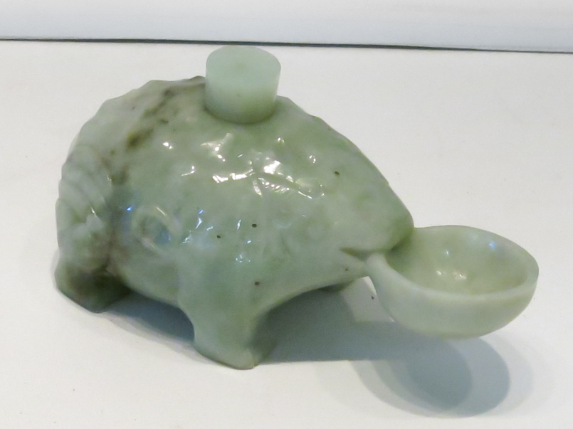 Appraisal: CHINESE CARVED GREEN JADE FROG a hollow frog-form vessel with