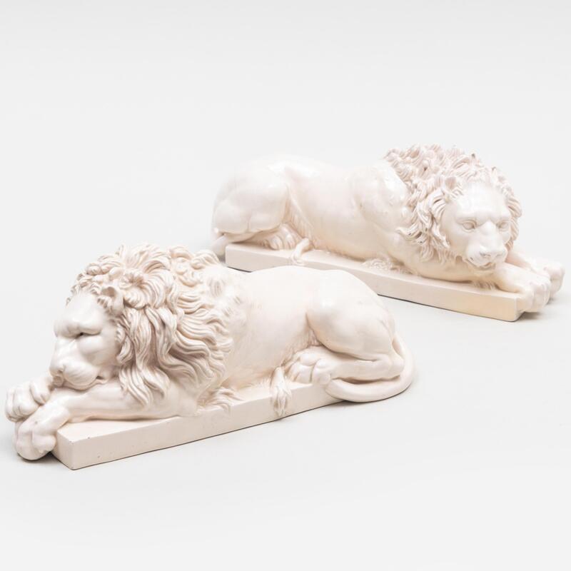 Appraisal: Pair of Faience Models of Lions Unmarked x x in