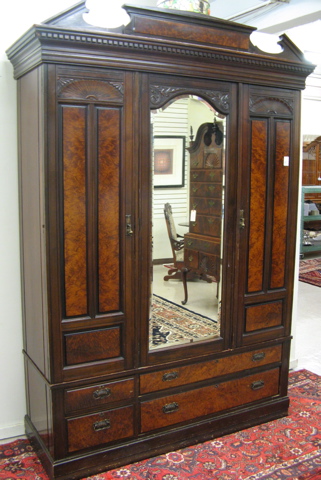 Appraisal: A MAHOGANY AND BURL WALNUT WARDROBE English c the interior