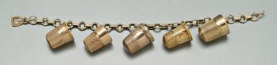 Appraisal: Gold thimble bracelet five vintage solid gold thimbles two marked