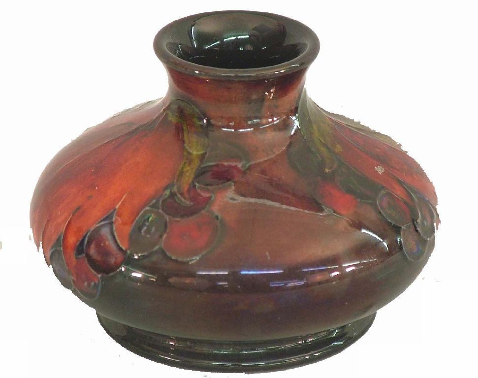 Appraisal: Moorcroft 'Flambe Leaves and Fruit' ovoid squat vase impressed factory