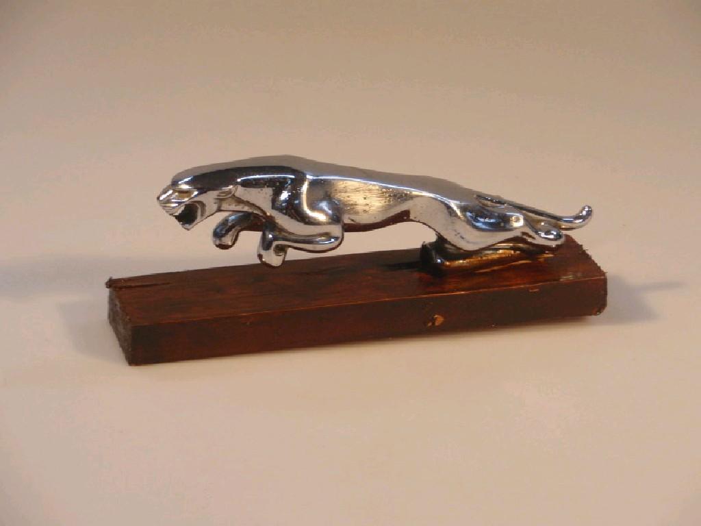 Appraisal: A chromium plated leaping jaguar car mascot cm