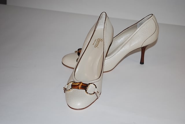 Appraisal: Gucci Sand beige textured leather pumps w wood and gold