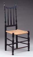 Appraisal: BLACK PAINTED BANISTER BACK SIDE CHAIR th Century Three molded