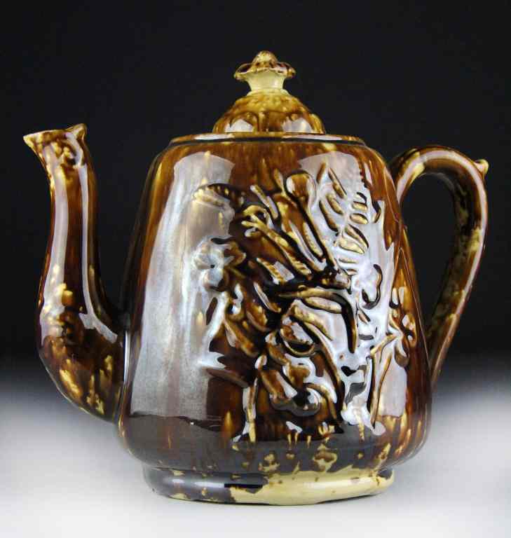 Appraisal: Early American Bennington TeapotLarge sturdy teapot depicting ferns and floral