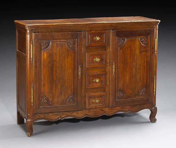 Appraisal: A Louis XV style oak and walnut buffet last quarter