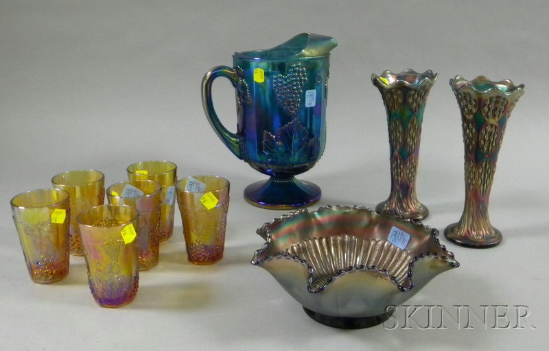 Appraisal: Ten Pieces of Carnival Glass a footed beverage pitcher a