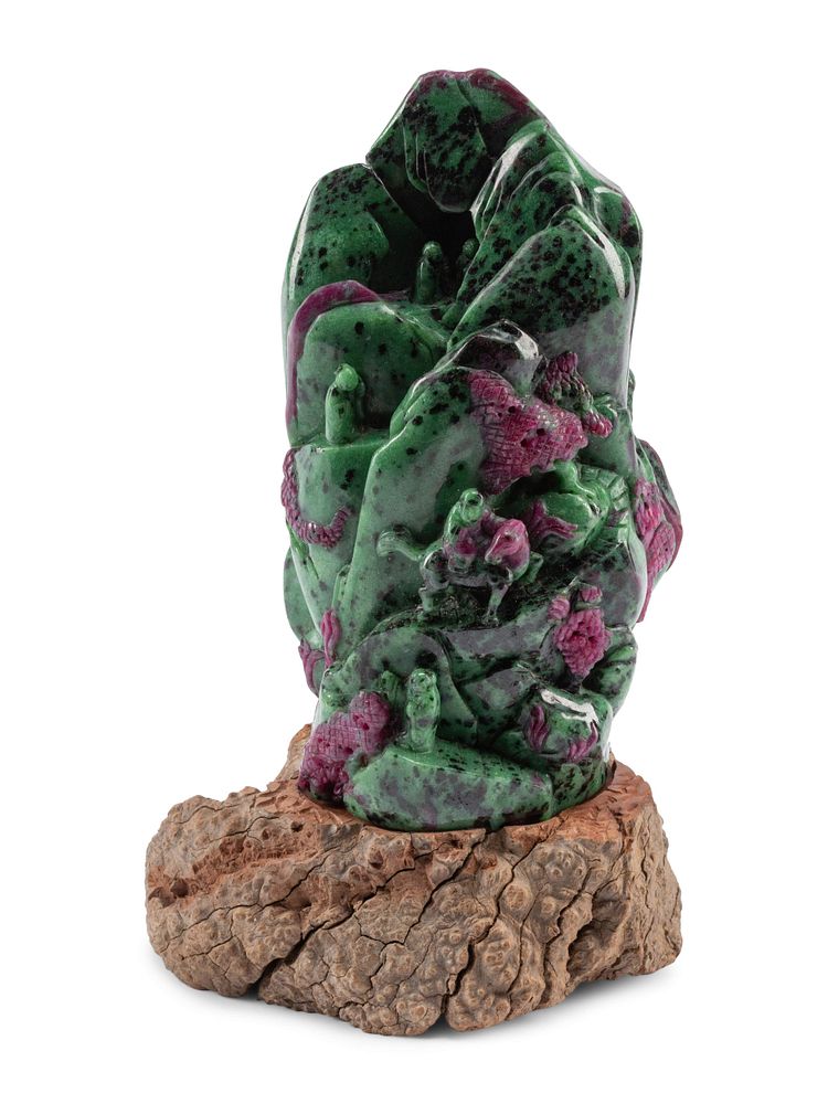 Appraisal: A Chinese Carved Ruby Zoisite Boulder on a Wood Base