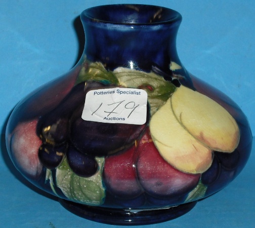 Appraisal: Moorcroft Squat Vase decorated in the Wisteria design height cm