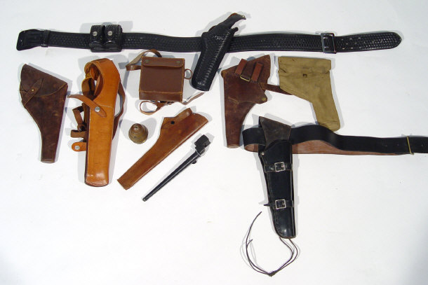 Appraisal: Collection of leather gun holsters some of military interest together