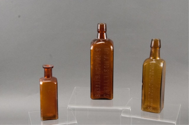 Appraisal: Assortment of Three Brown Medicinal Glass Bottles Including a Dr