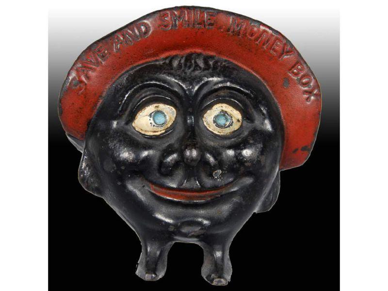 Appraisal: Cast Iron Save Smile Money Box Description '' T Condition