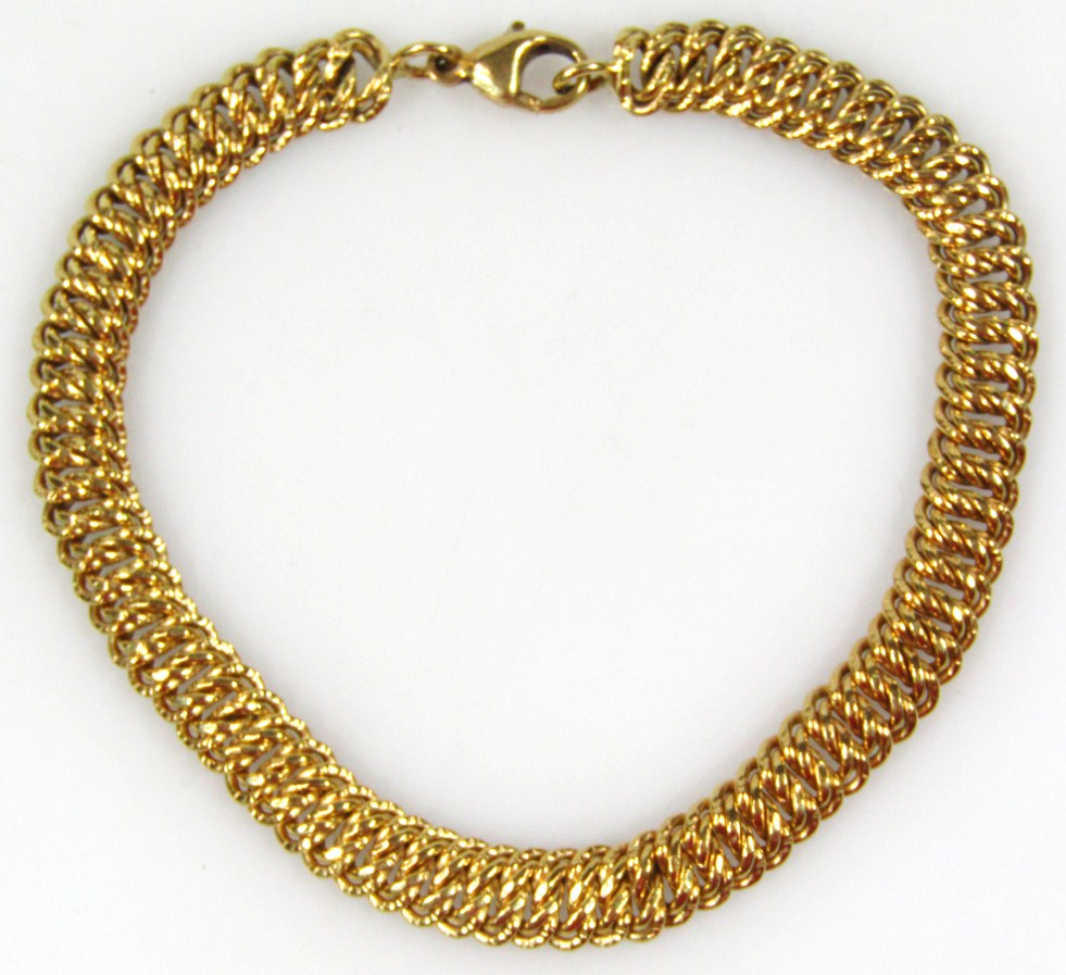 Appraisal: A fancy twist link bracelet yellow metal marked cm long