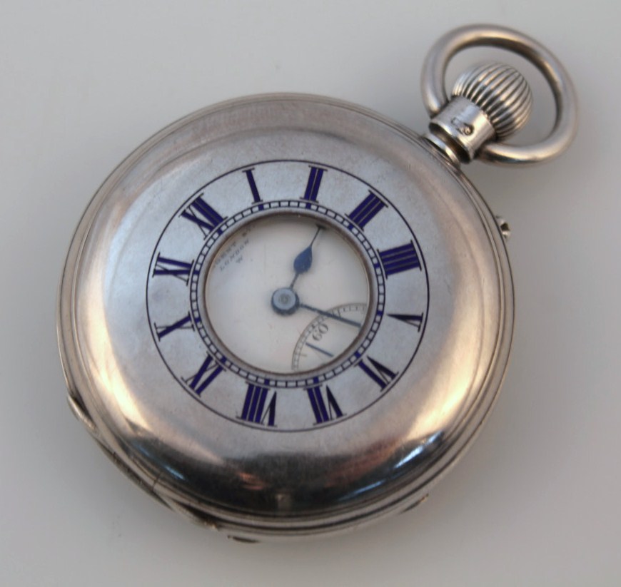 Appraisal: A late Edwardian gentleman's silver half hunter pocket watch by