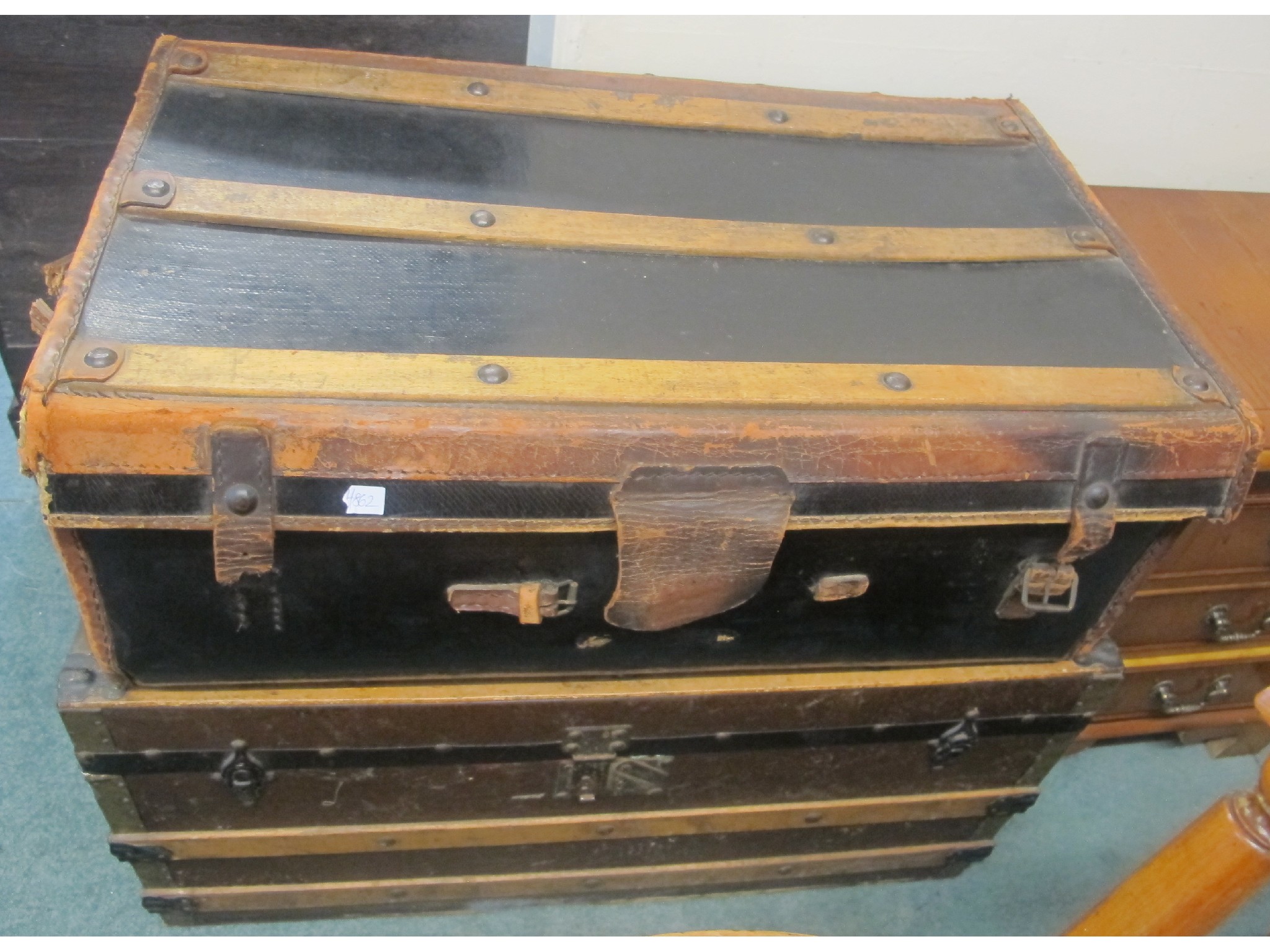 Appraisal: Two wooden bound travel trunks