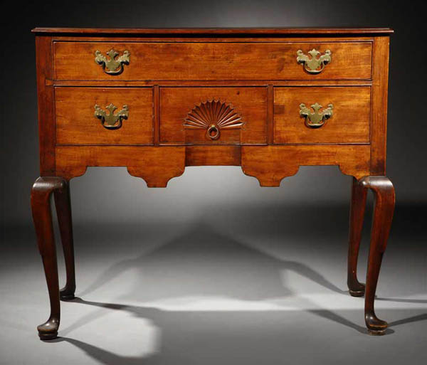 Appraisal: A Chippendale walnut dressing table New England A Chippendale walnut