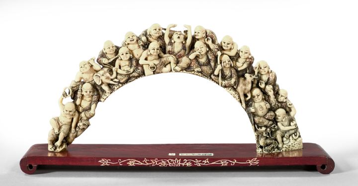 Appraisal: Chinese Meiji Elaborately Carved and Patinated Hippo Ivory first quarter