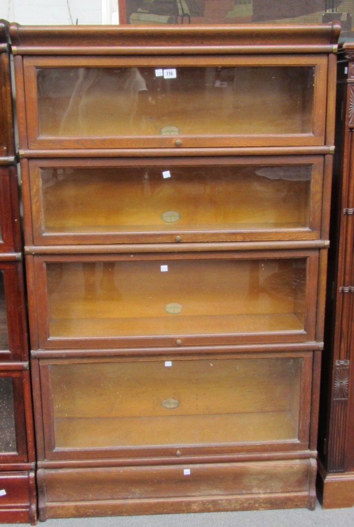 Appraisal: A th century oak Globe Wernicke four section bookcase cm