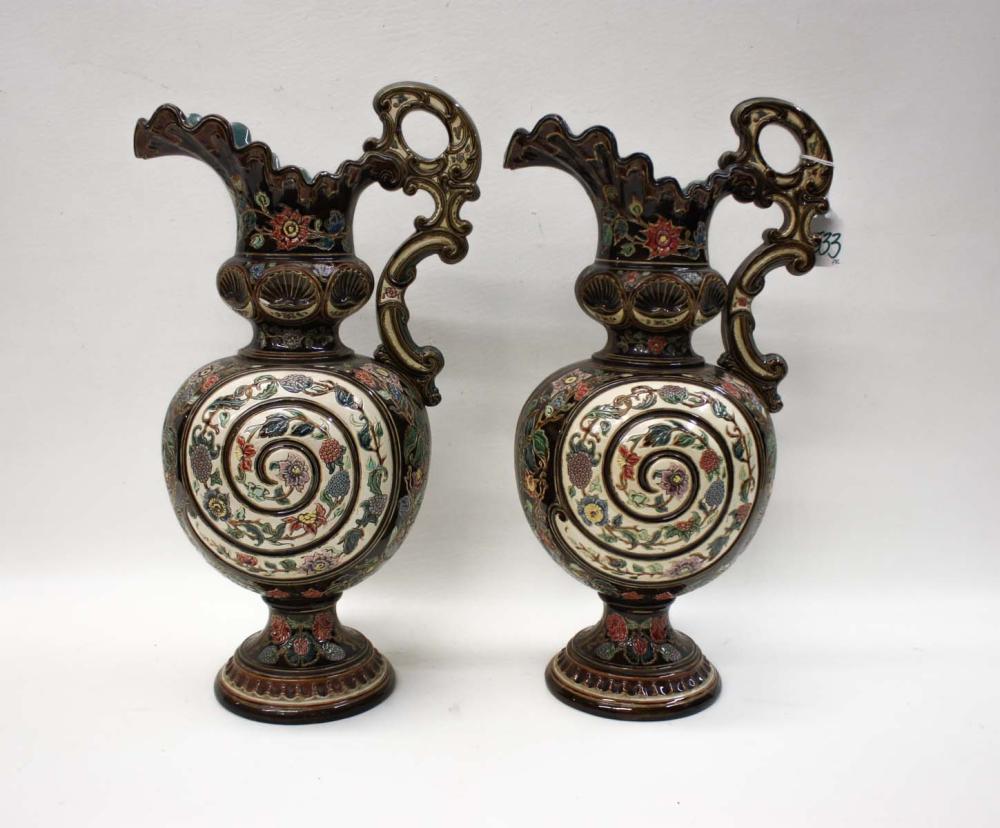 Appraisal: PAIR OF GERBING STEPHAN MAJOLICA EWERS with manufacturer's trademark on