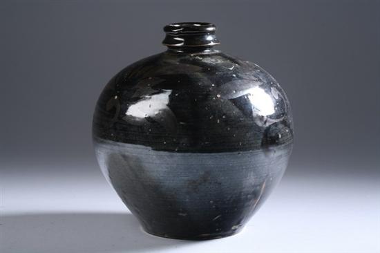 Appraisal: CHINESE BLACK GLAZED PORCELAIN JAR Of ovoid-form with brown floral