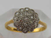 Appraisal: An carat yellow gold and platiunum set diamond cluster ring