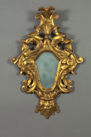 Appraisal: North Italian Carved Giltwood Looking Glass in the Baroque style