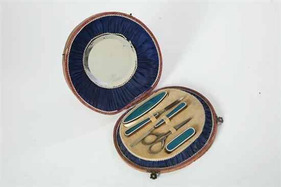 Appraisal: GUILLOCHE MANICURE SET Set includes a buffer file smoother small