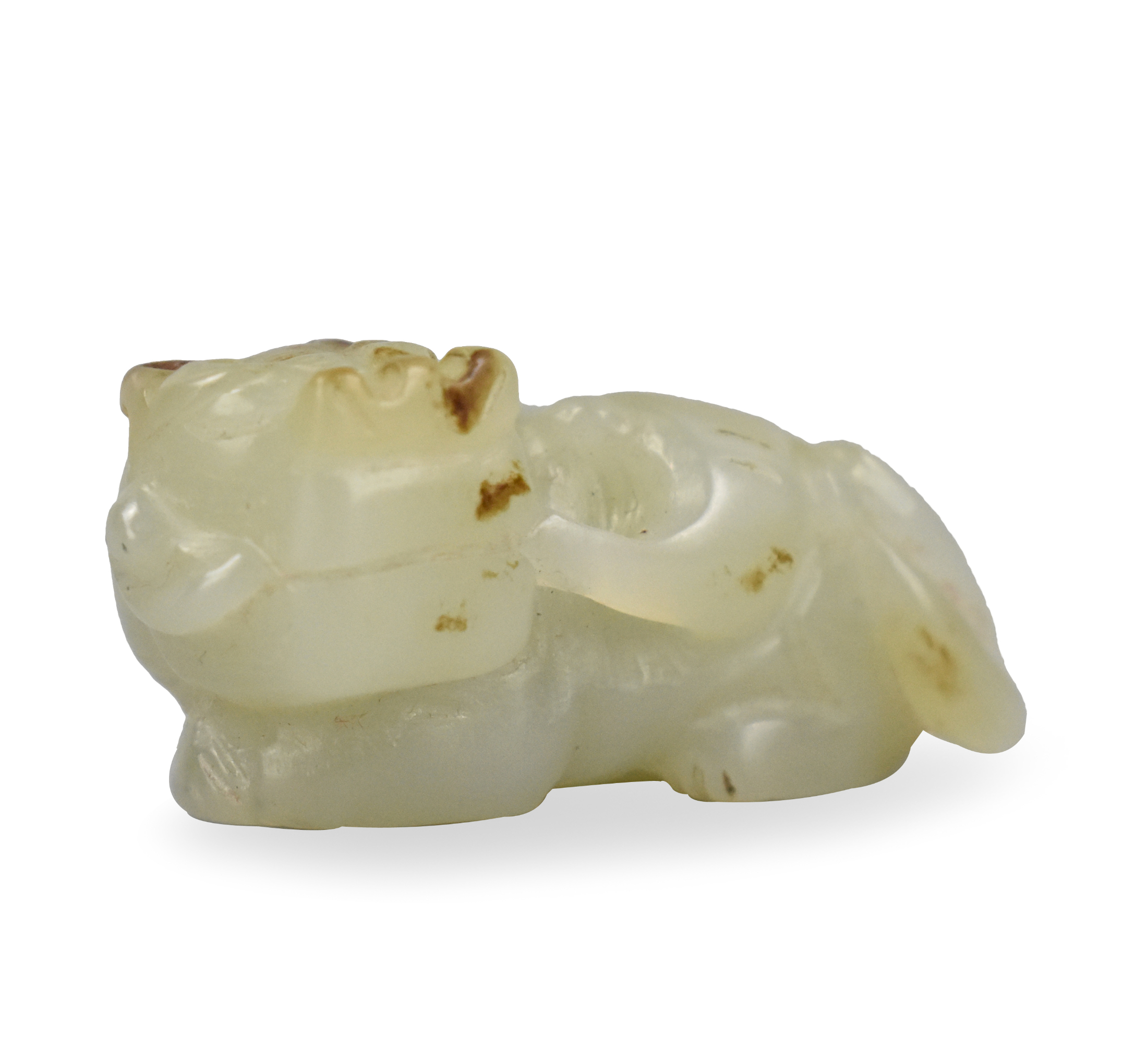 Appraisal: A Chinese qingbai jade carving of a beast dating from