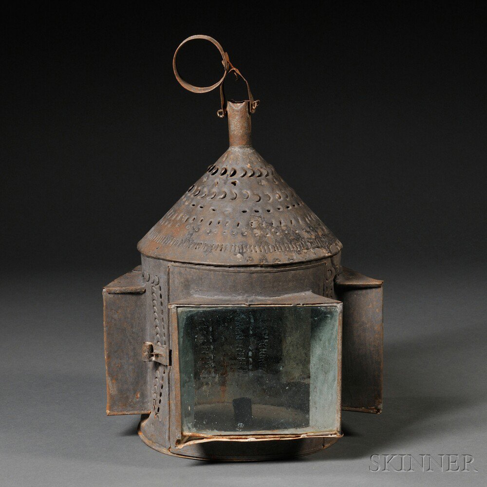 Appraisal: Pierced Tin and Glass Candle Lantern America early th century