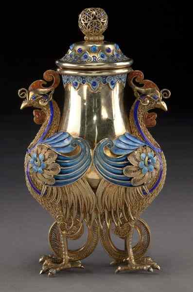 Appraisal: Chinese enamel over silver covered jar depicting two phoenix ''H