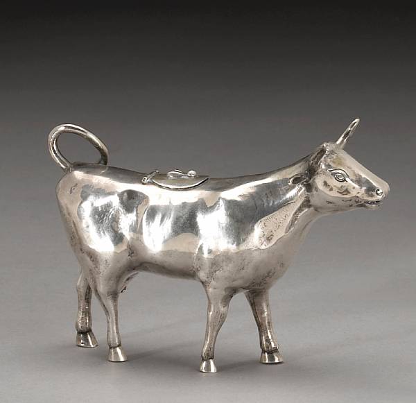 Appraisal: A Dutch silver cow form cream pitcherH Hooykaas 's Gravenhage