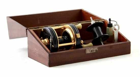 Appraisal: Ambassadeur De Luxe fishing reel in fitted wood case with