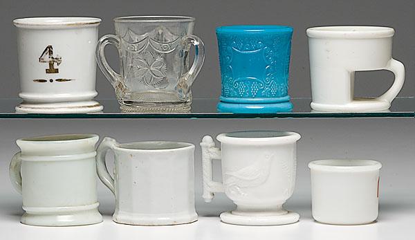 Appraisal: EIGHT ROOM AND GLASS SHAVING MUGS first plain porcelain with