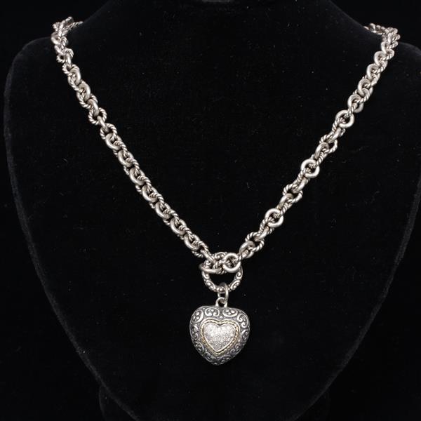 Appraisal: Effy sterling silver and K gold heart pendant with diamond