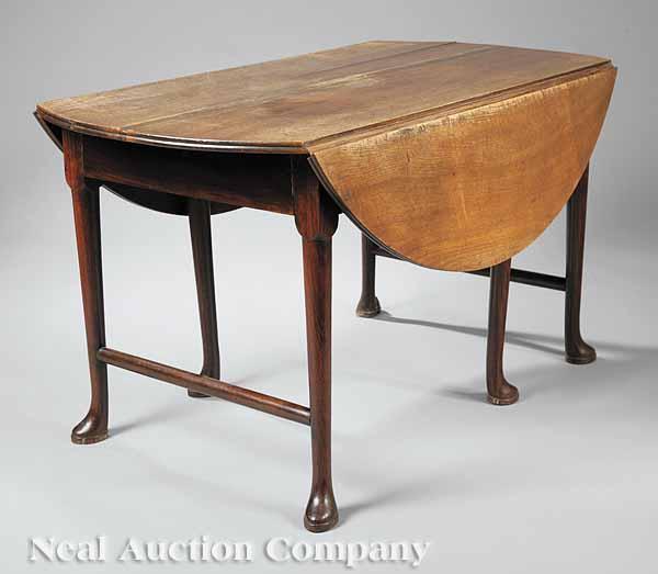 Appraisal: A Colonial Revival Walnut Drop-Leaf Table late th c double