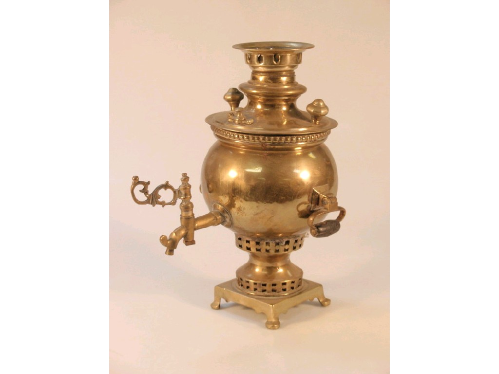 Appraisal: An early thC brass samovar with loop handles on a