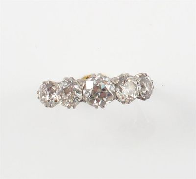 Appraisal: A diamond five stone ring The five graduated cushion shaped