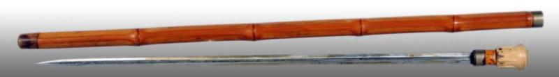 Appraisal: Bamboo Gadget Cane Walking Stick Description Dated Concealed sword Condition