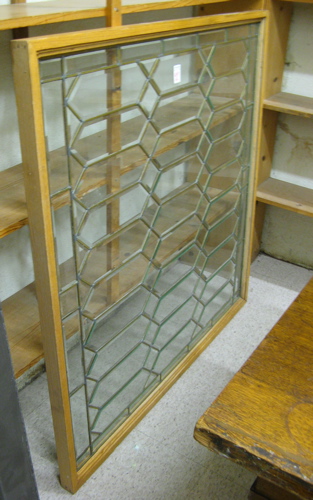 Appraisal: AN AMERICAN BEVELED GLASS WINDOW having brass plated leadwork in