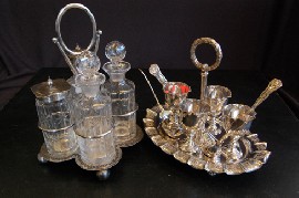 Appraisal: VICTORIAN SILVER PLATED FOUR BOTTLE CRUET AND EGG CUPS STAND