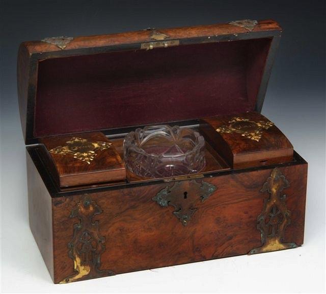 Appraisal: A VICTORIAN WALNUT DOME TOP TEA CADDY with engraved brass