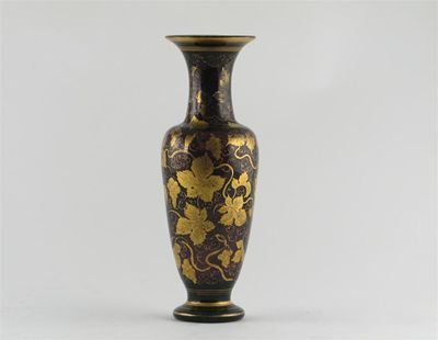 Appraisal: An amethyst glass vase lavishly decorated with a gilt grapevine