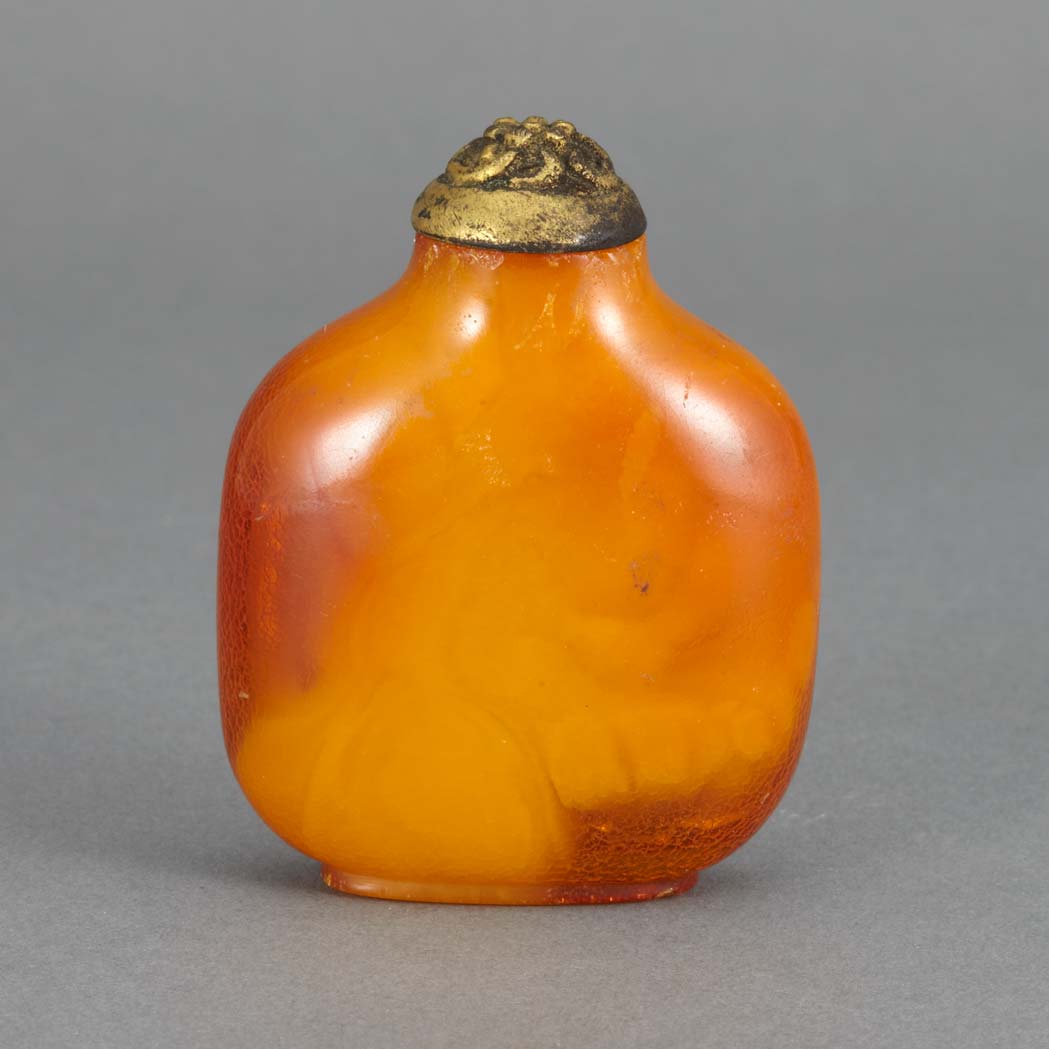 Appraisal: Chinese Amber Snuff Bottle th Century Of compressed rectangular shape